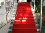 Cobertura da escadaria com tapete vermelho