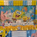 #decoracaobobesponja
Com babado vual e tela de bales em torno do painel